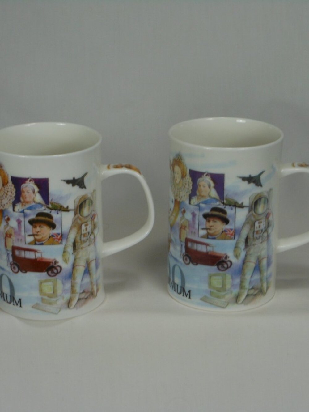 pair of Dunoon UK Millennium 2000 colorful coffee mugs